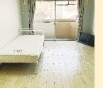 ベッドのある室内の掲載写真。部屋番号は未特定